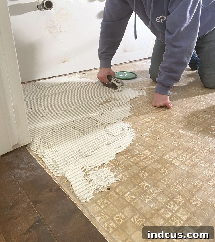 Bathroom floor with cement board installed, ready for tiling