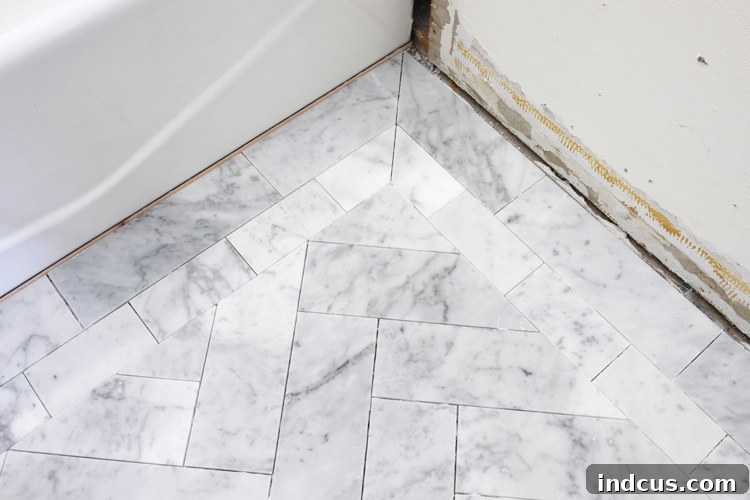 In-progress bathroom remodel showing new floor