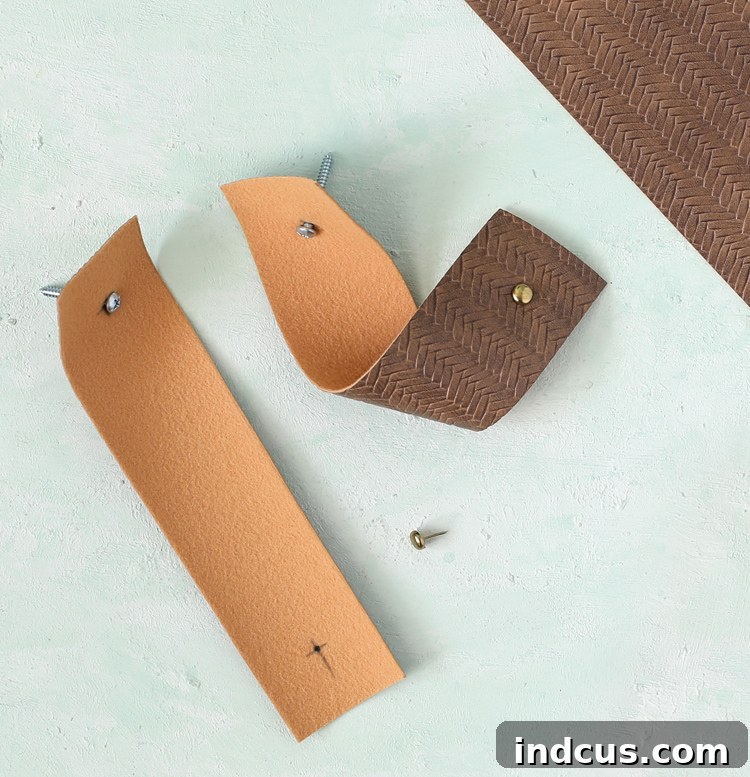 Craft Your Own Basket Wall Art 4 Close-up showing a screw and decorative brad inserted into a leather strap