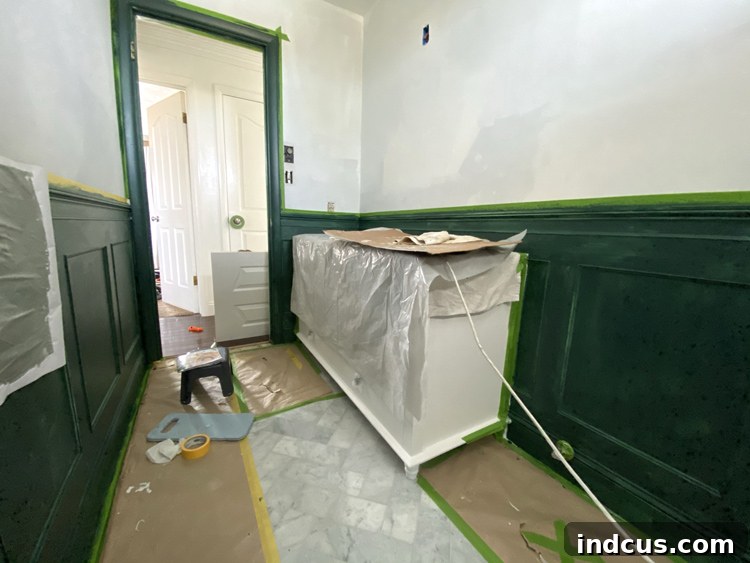 Bathroom wainscoting painted in a vibrant, incorrect green.