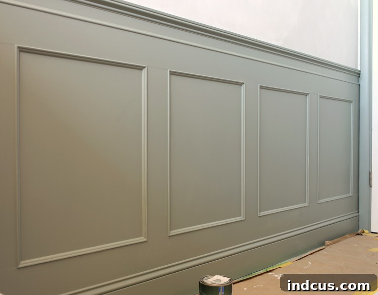 Close-up of the elegant Sherwin-Williams Acacia Haze wainscoting.