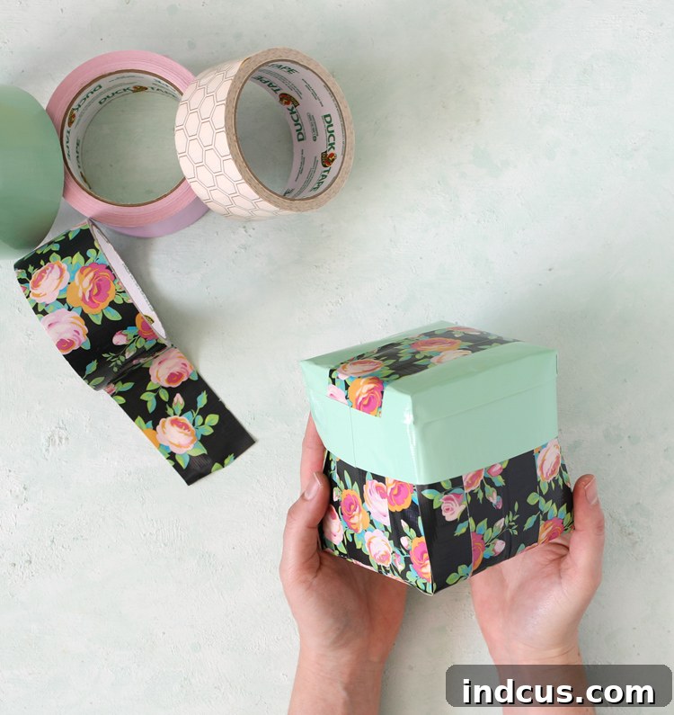 A vibrant Duck Tape pop-out surprise box, perfect for gifting, showcasing colorful layers and personalized touches.