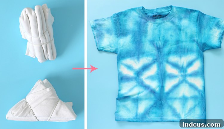 Vibrant Tie Dye Patterns to Craft 11 Finished shibori tie-dye pattern on a t-shirt, featuring abstract geometric designs in blue.