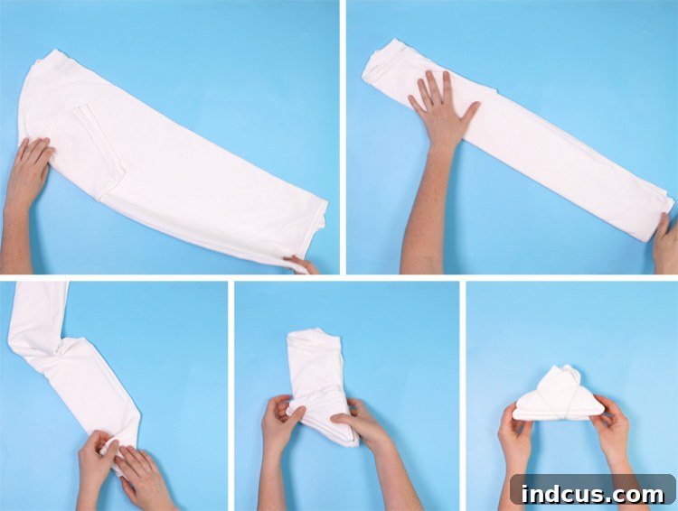 Vibrant Tie Dye Patterns to Craft 10 T-shirt carefully folded into an accordion triangle for a shibori tie-dye pattern.
