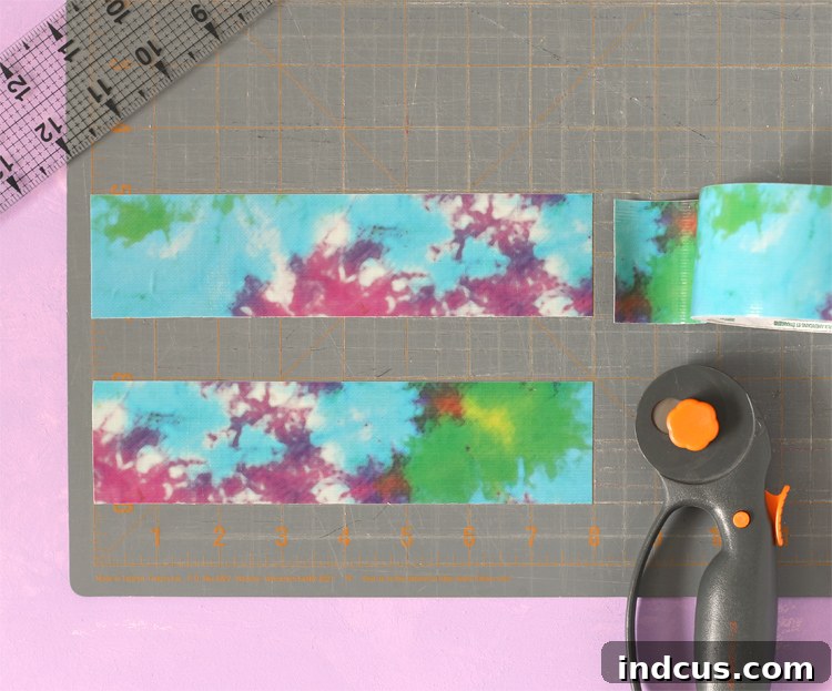 Clever Duck Tape Sanitizer Carriers 6 Two pieces of Duck Tape being stuck together to create a double-sided strip.