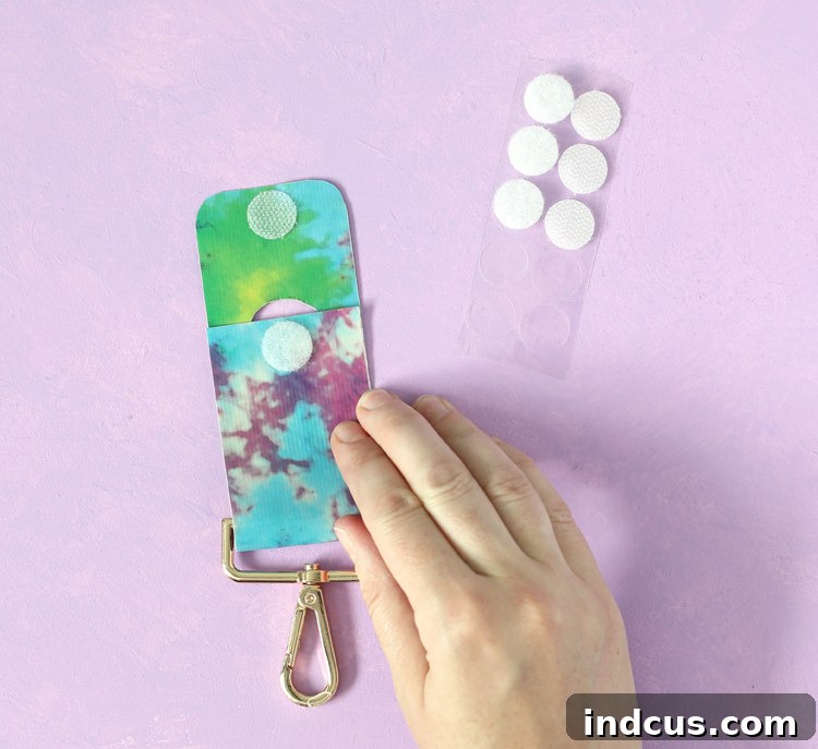 Clever Duck Tape Sanitizer Carriers 10 Attaching hook and loop dots to the Duck Tape hand sanitizer holder for closure.