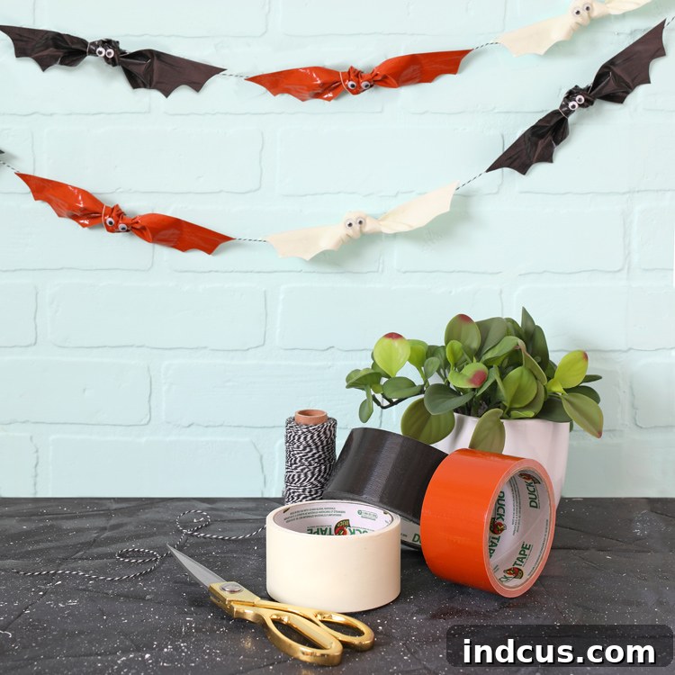 Make these darling easy DIY bats for Halloween using Duck Tape. They're waterproof and perfect for outdoor Halloween decorating!