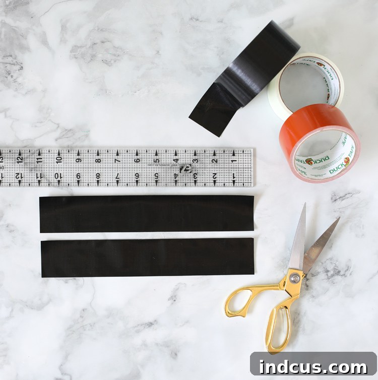 Cutting and adhering two pieces of Duck Tape together