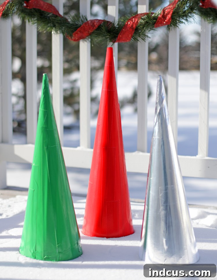 Giant outdoor Christmas cone trees decorated with duck tape