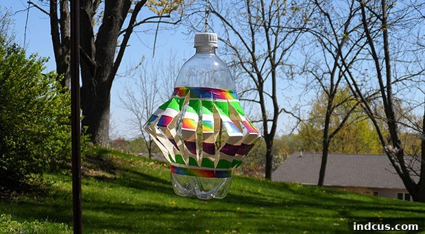 Recycled plastic bottle transformed into a colorful duck tape wind spinner