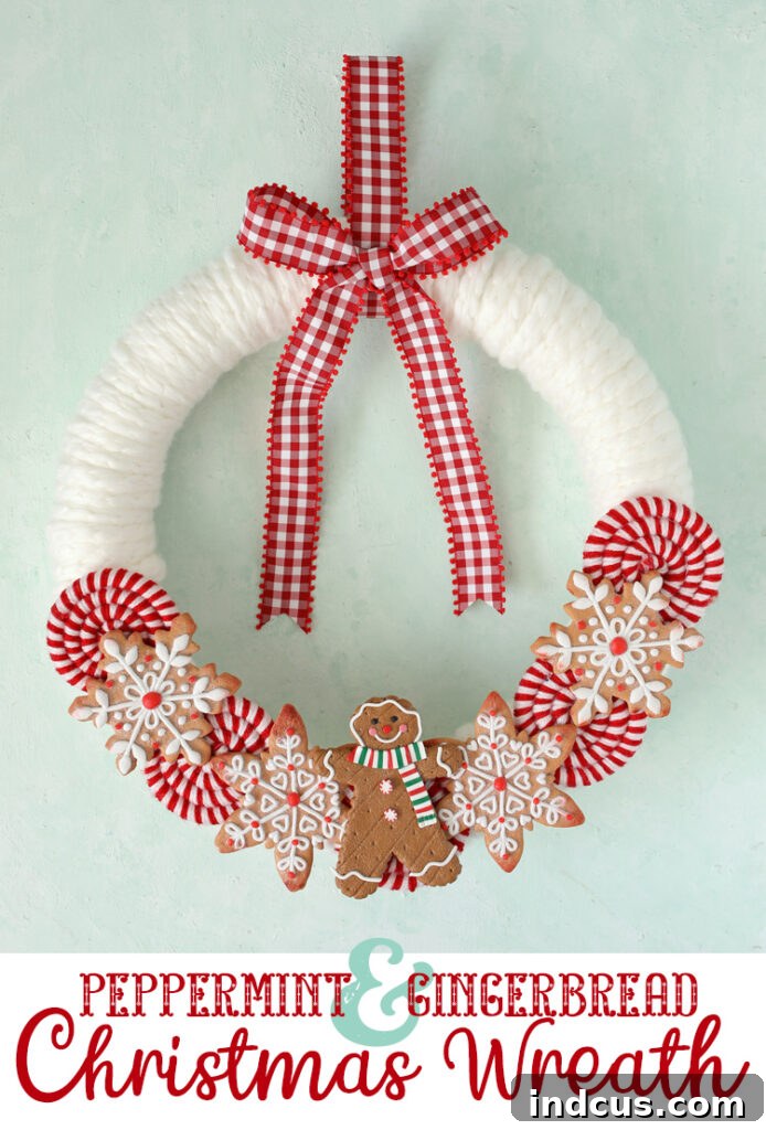 Close-up of a decorated porch with gingerbread man, candy cane hearts, and gingerbread house frosting