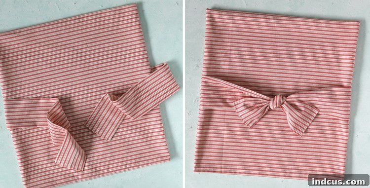 Image demonstrating the hemming process for an easy DIY chair back cover.