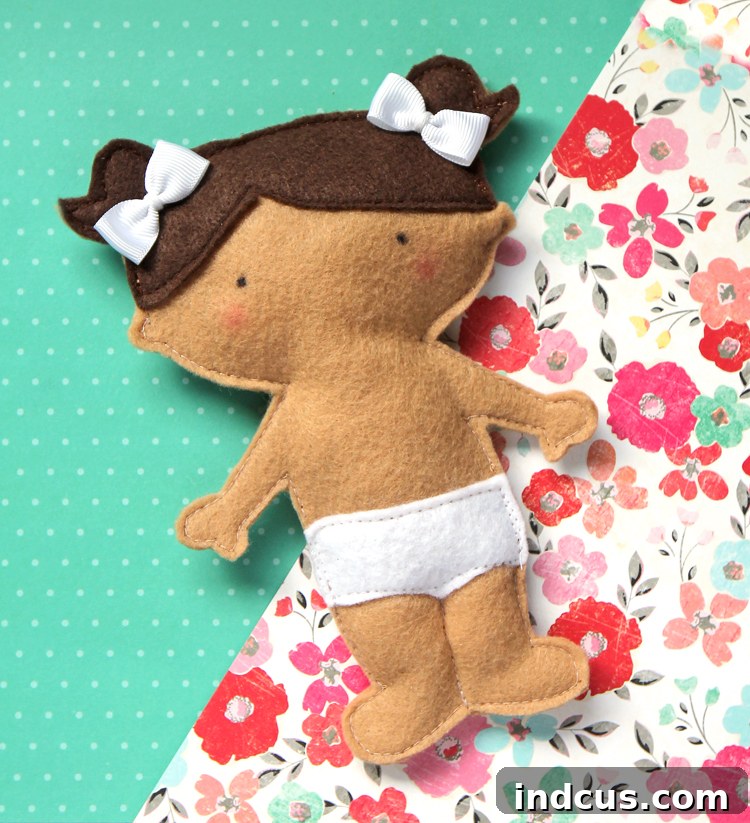 Free sewing pattern and tutorial for a felt dolly