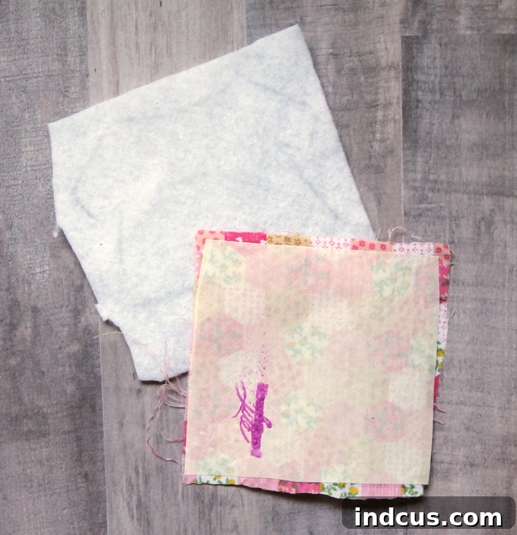 Use Heat'N Bond to attach fabric to felt