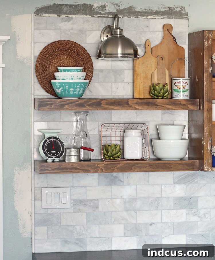 Detail of marble pencil tile finishing backsplash edge