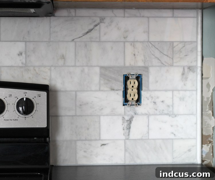 Clean border of kitchen backsplash with pencil tile