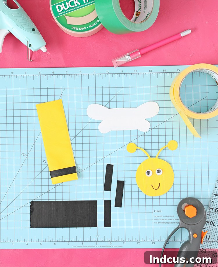 Various Duck Tape animal faces crafted for ice pop holders