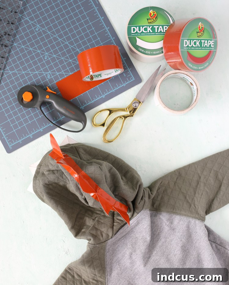diy dinosaur costume with duck tape spikes