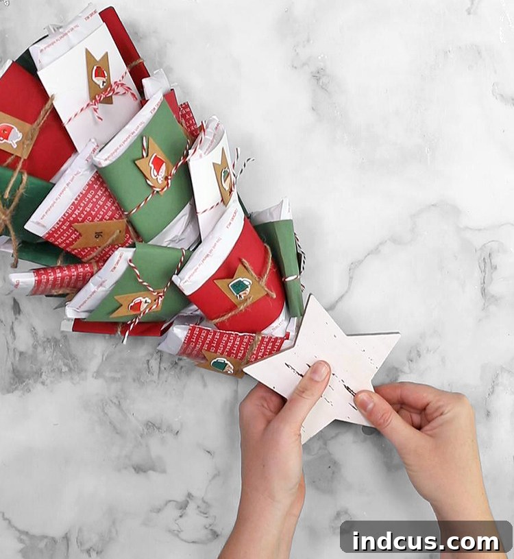 Hot Cocoa Tree Topped with Wooden Star and Garland