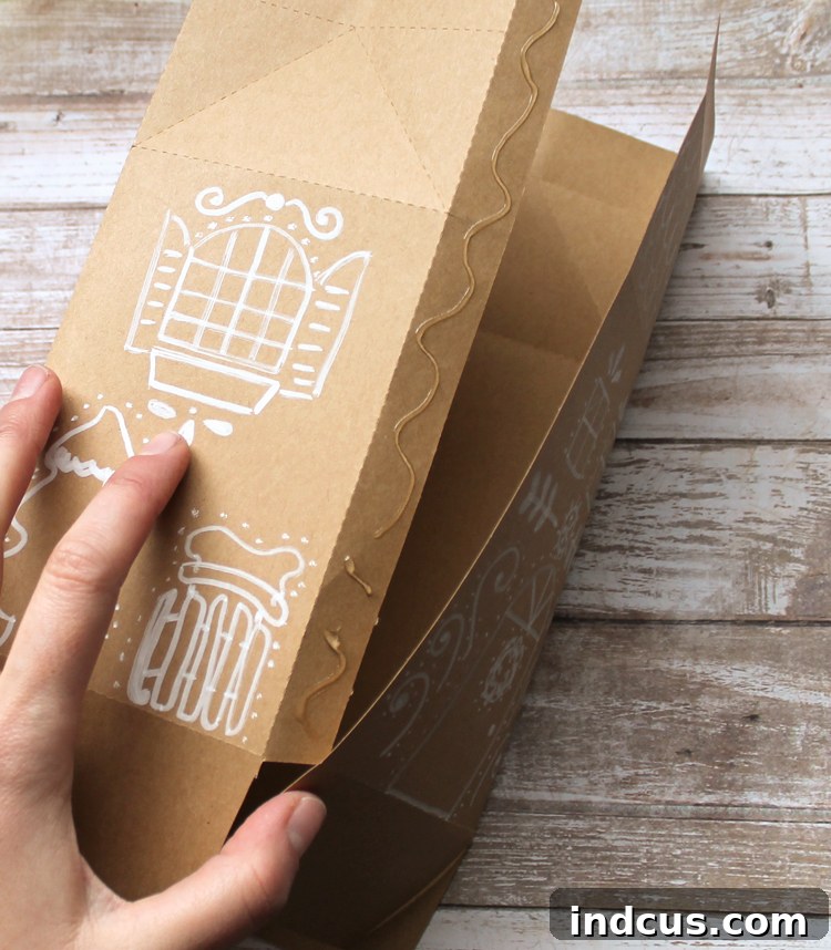 Sweet Gingerbread Treat Box SVG Template 7 Completed kraft paper gingerbread house cube structure