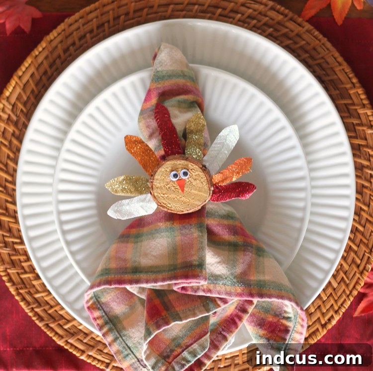 DIY Thanksgiving napkin ring featuring a cute wood slice turkey craft