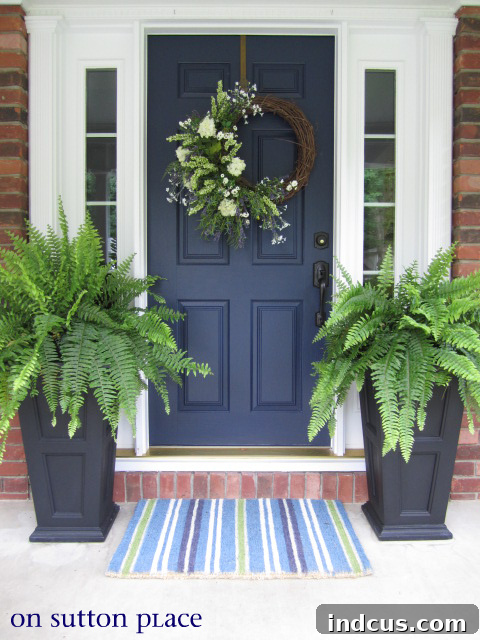Lush fern topiaries in elegant planters
