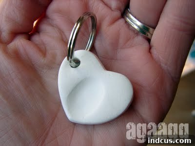 Thumbprint clay heart keychains, a sentimental keepsake made by children's tiny fingers.