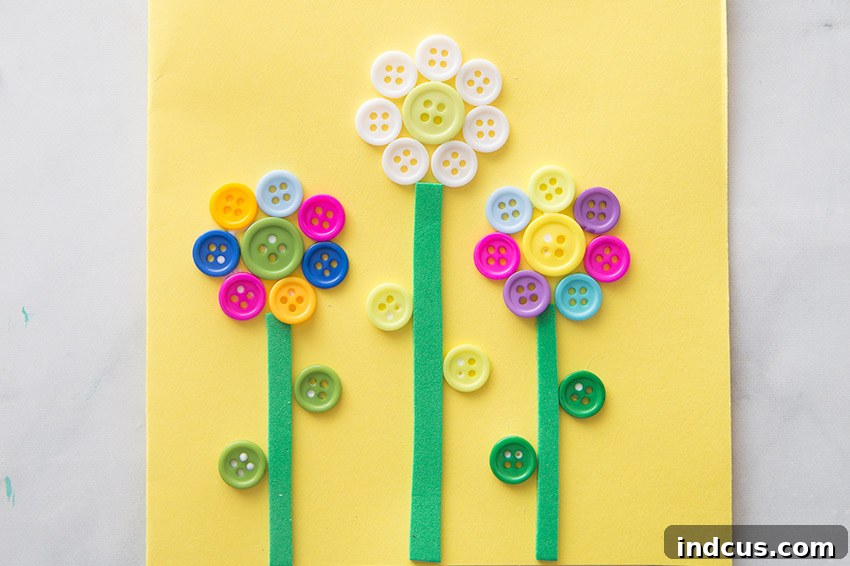 A cheerful flower button art card featuring a vibrant design, perfect for Mother's Day.