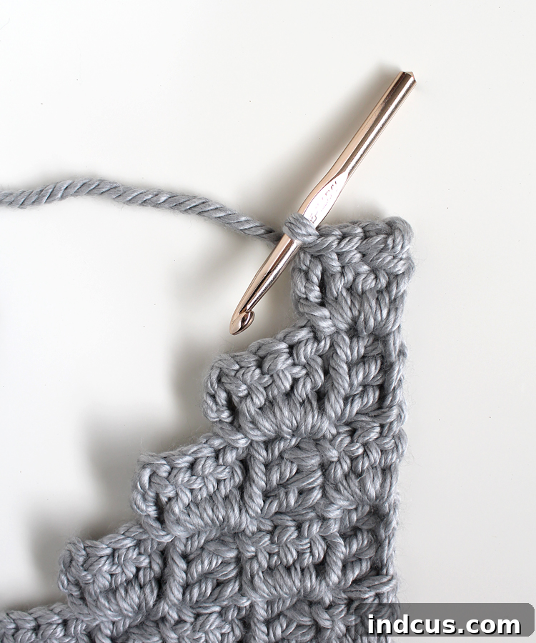Crochet Pillow Tutorial Step 11: Sl st across top three stitches to begin decrease
