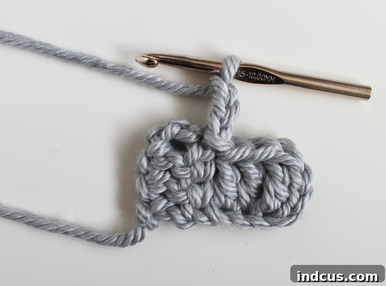 Crochet Pillow Tutorial Step 5: Sl st in corner of previous block, Ch 3