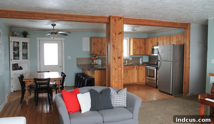 Kitchen before renovation with pillar and old layout