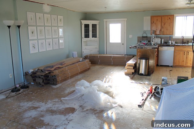Kitchen during remodeling process, showing structural changes and ongoing work