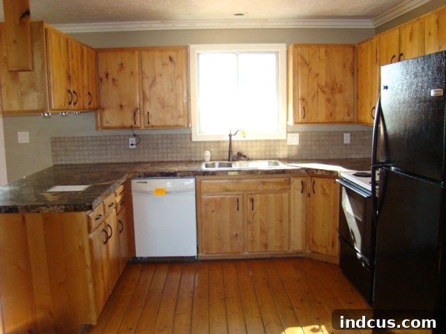 Before layout: U-shaped kitchen with peninsula, to be transformed into an island kitchen