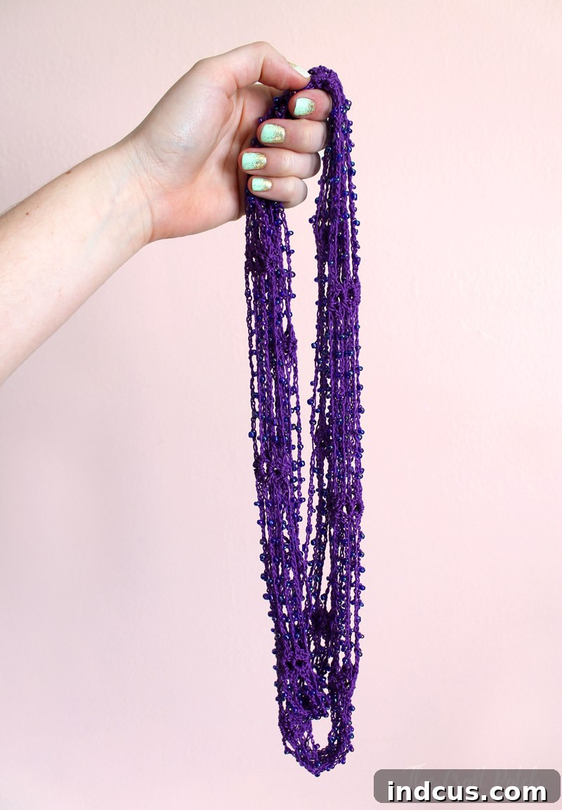 Stunning handmade beaded crochet wrap necklace with intricate details