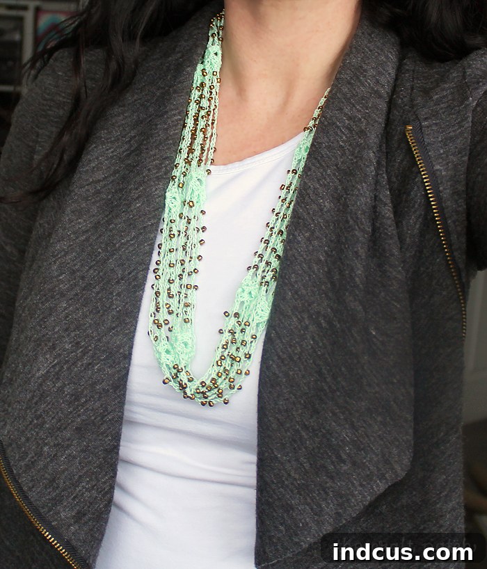 Stylishly worn beaded crochet necklace showcasing its versatility