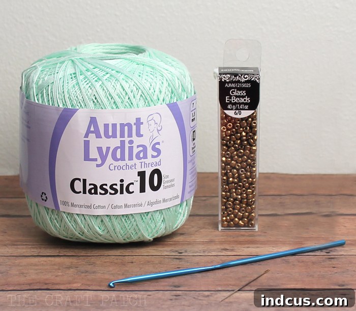 Size 10 crochet thread and glass E-beads displayed for crafting
