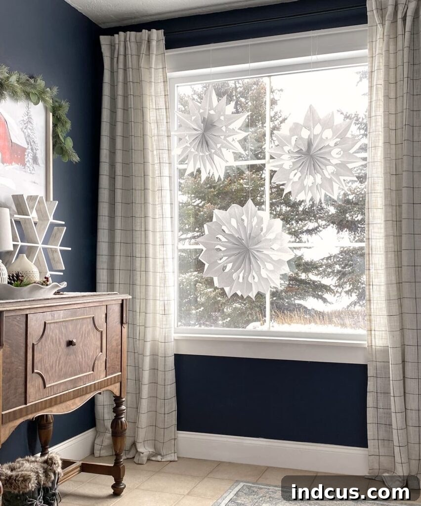Glimmering Paper Star Lanterns 11 A cluster of beautifully illuminated paper bag stars gracefully hanging in a window during the day