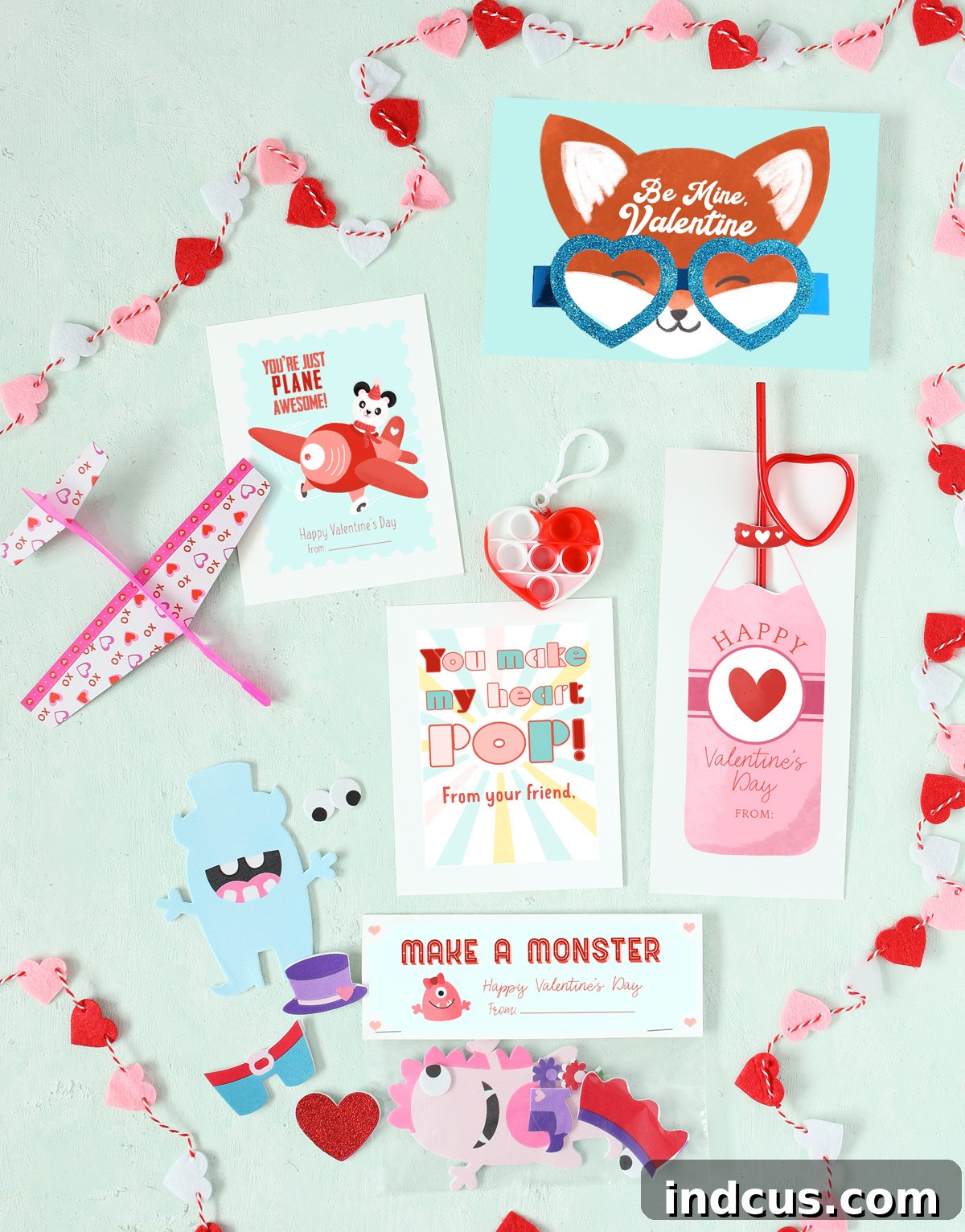 Collection of five unique printable Valentine's Day cards for kids, each paired with a fun toy, featuring designs like airplanes, monsters, foxes with glasses, pop-it hearts, and crazy straws.