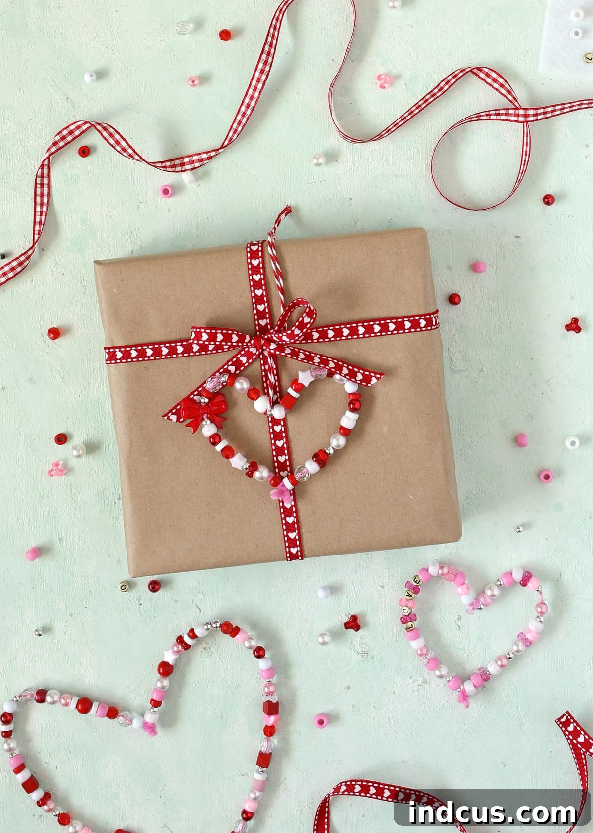 Completed beaded heart ready to be used as a gift topper or decoration.