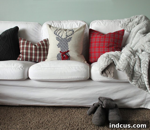Our Christmas Wonderland 7 Cozy DIY Christmas pillows adding festive charm and comfort to the living room seating.