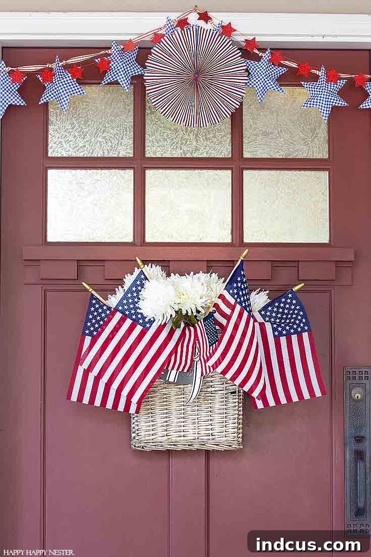 Front door basket filled with flowers and small American flags