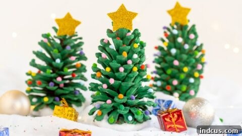 Pinecone Christmas trees decorated for the holidays