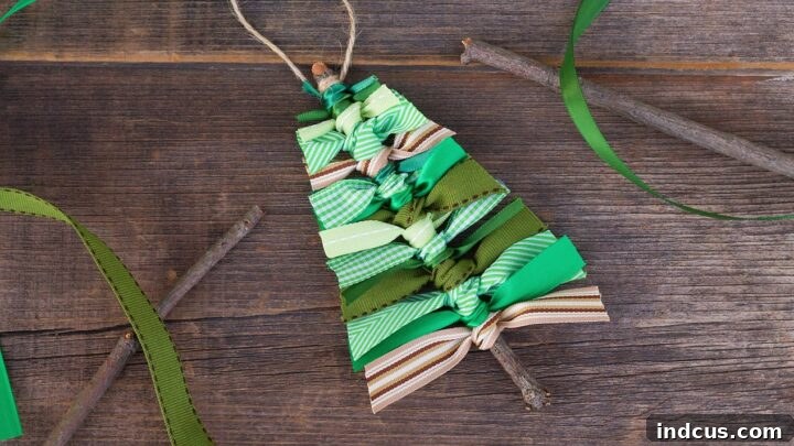 Scrap ribbon Christmas tree ornament on a stick