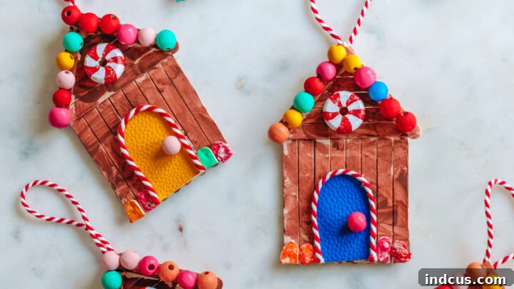 Popsicle stick gingerbread house ornaments with child's photo