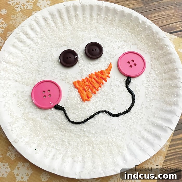 Paper plate snowman craft for winter fun