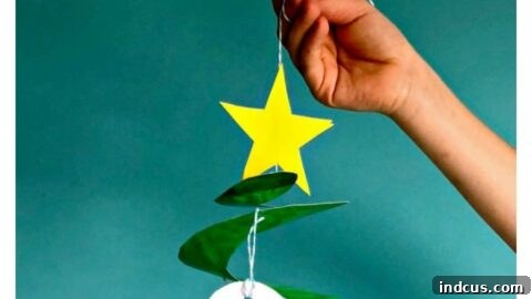 Paper plate Christmas tree whirligig craft