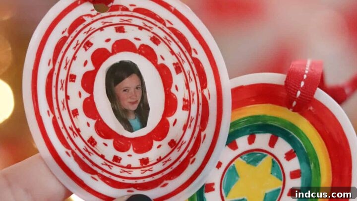 Christmas ornaments made by drawing on plastic cups and melting them