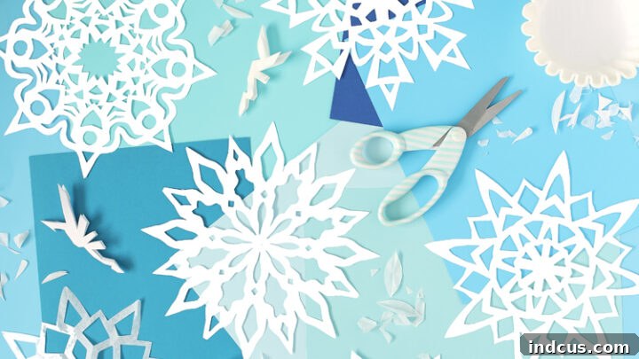 Tutorial on how to make intricate paper snowflakes