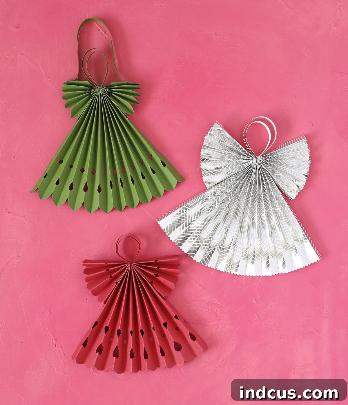 Vibrant cardstock colored paper Christmas angels showcasing diverse designs