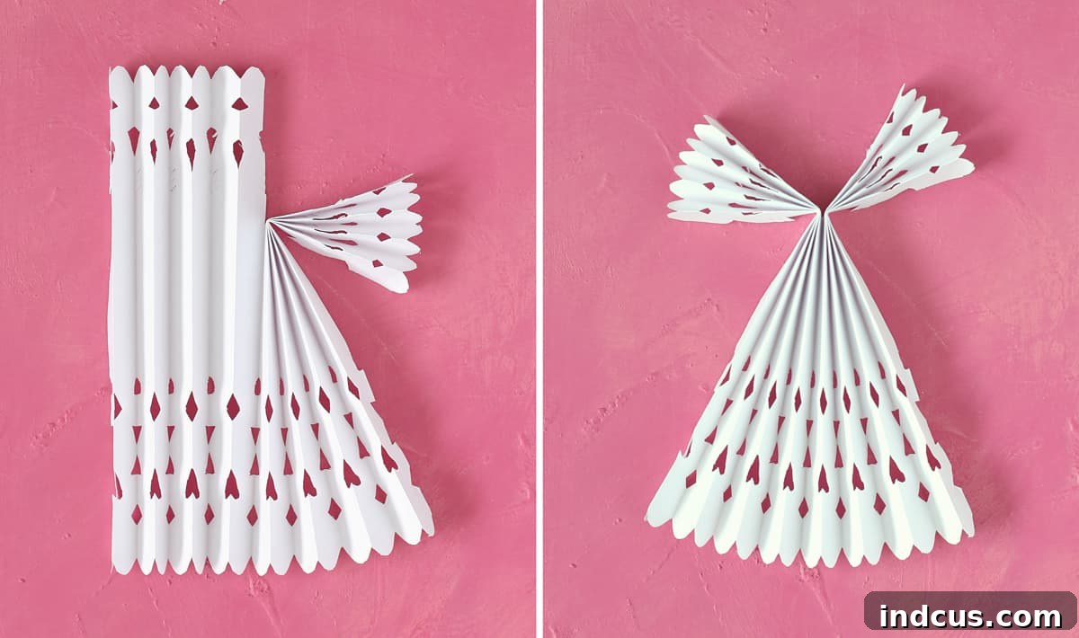Instructions for folding a paper angel's wings for a festive craft
